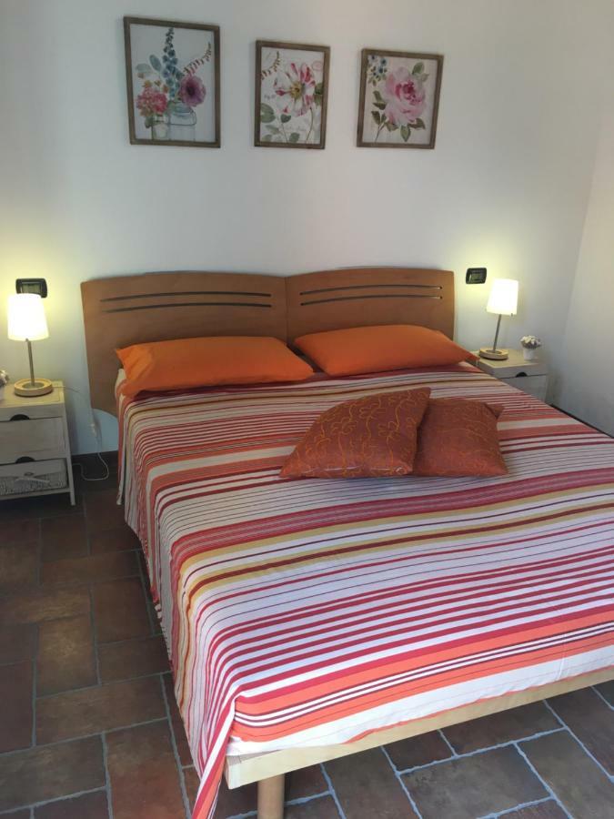 Bilocale Salice Terme Apartment Bagian luar foto